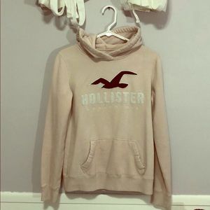 Woman’s pink Hollister hoodie